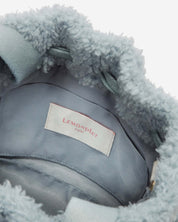 [SIGNATURE LINE] FAUX FUR BÉNÉ BUCKET BAG